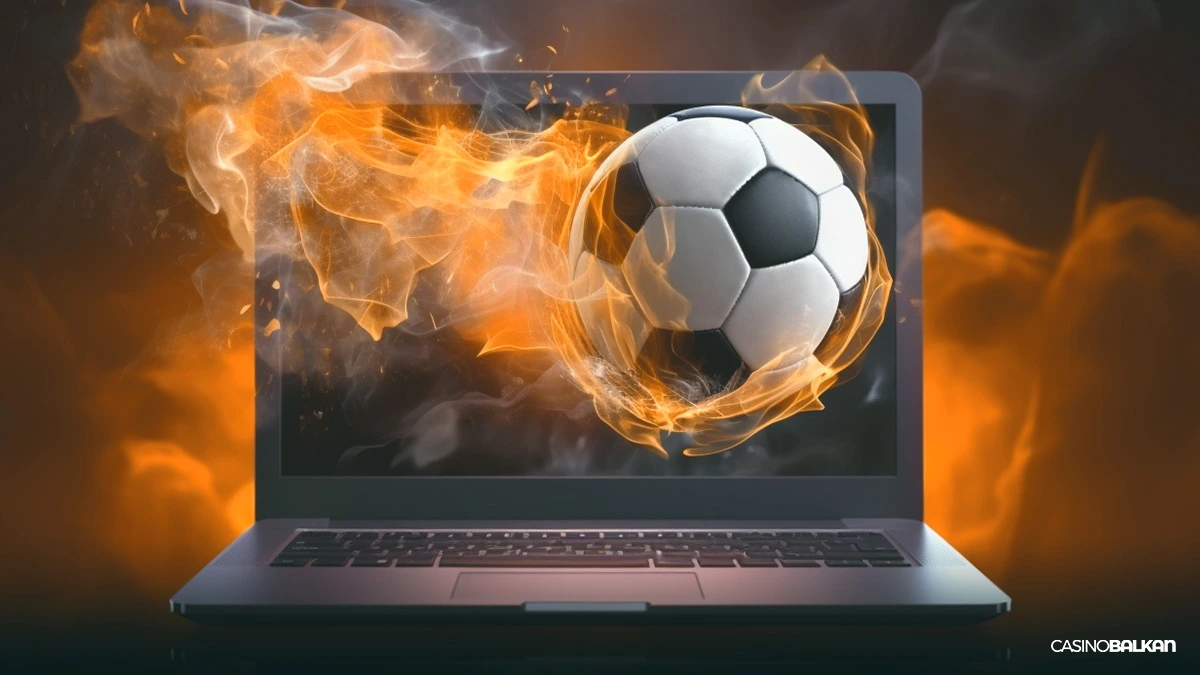 pucajući nogomet koji izlazi iz laptopa